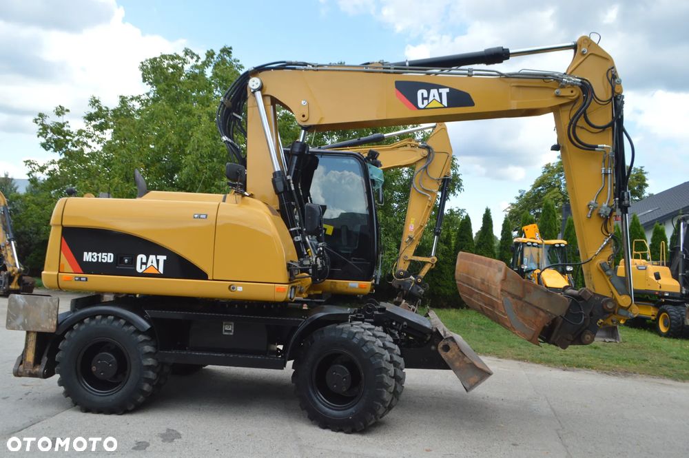 Caterpillar CAT M315D *2011* IDEALNY!!! - 11