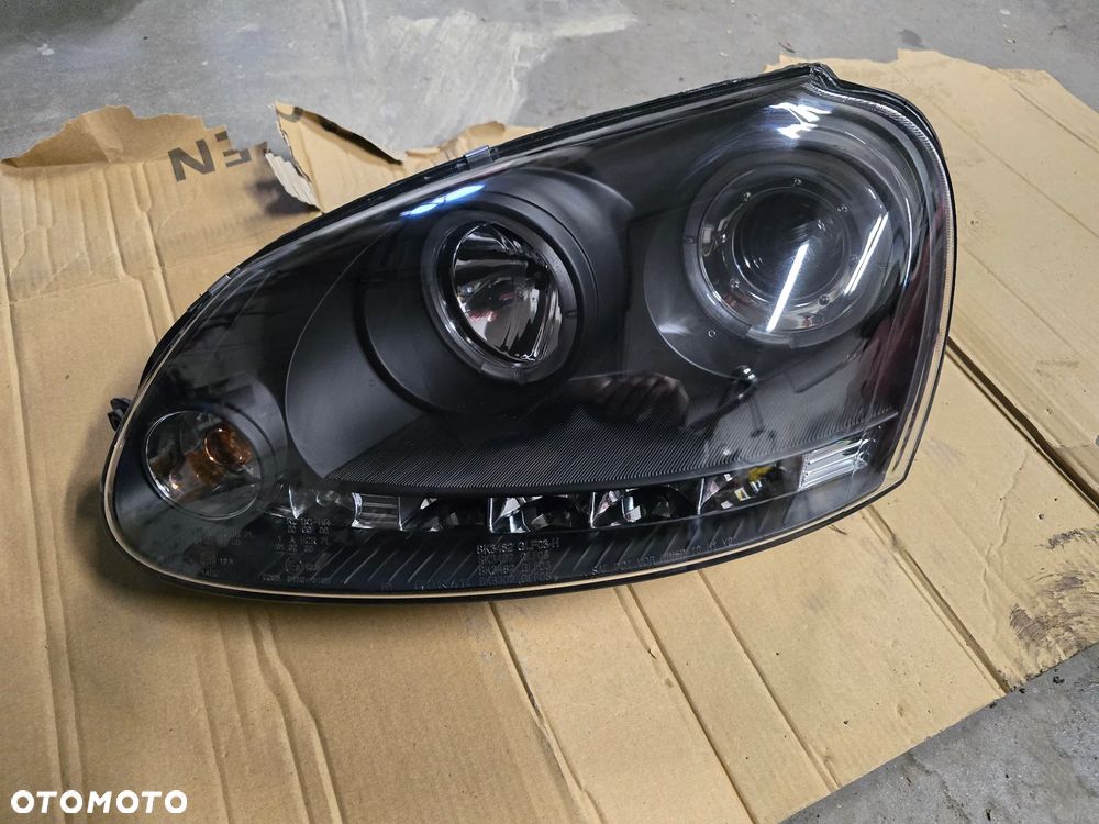 Reflektor lewy przód vw golf V soczewka ringi zamiennik - 1