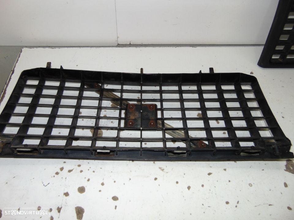 Volvo 244,245 grelha 1º modelo farol redondo - 4