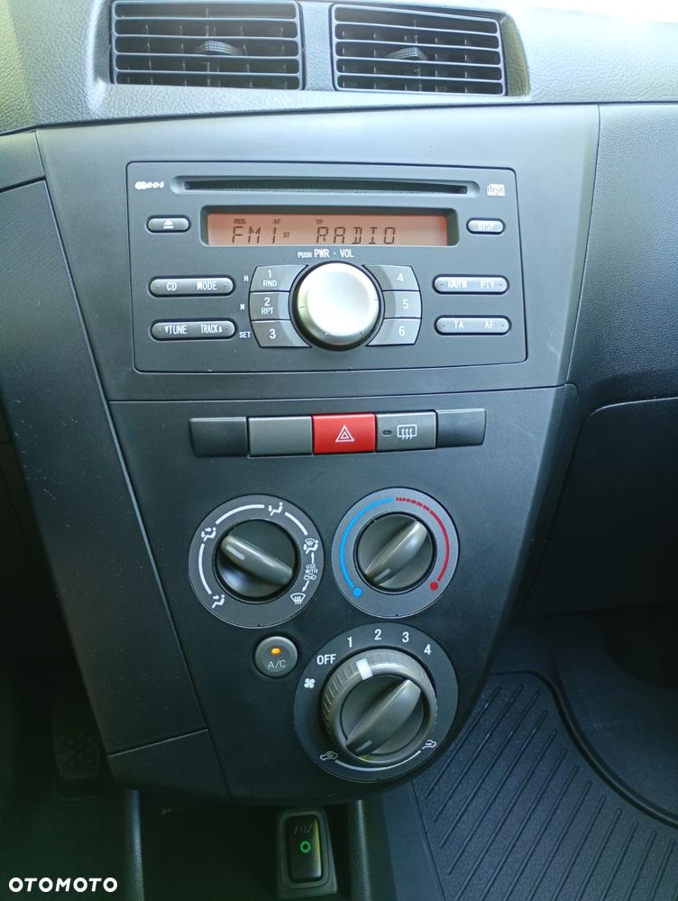Daihatsu Cuore 1.0 Top - 18