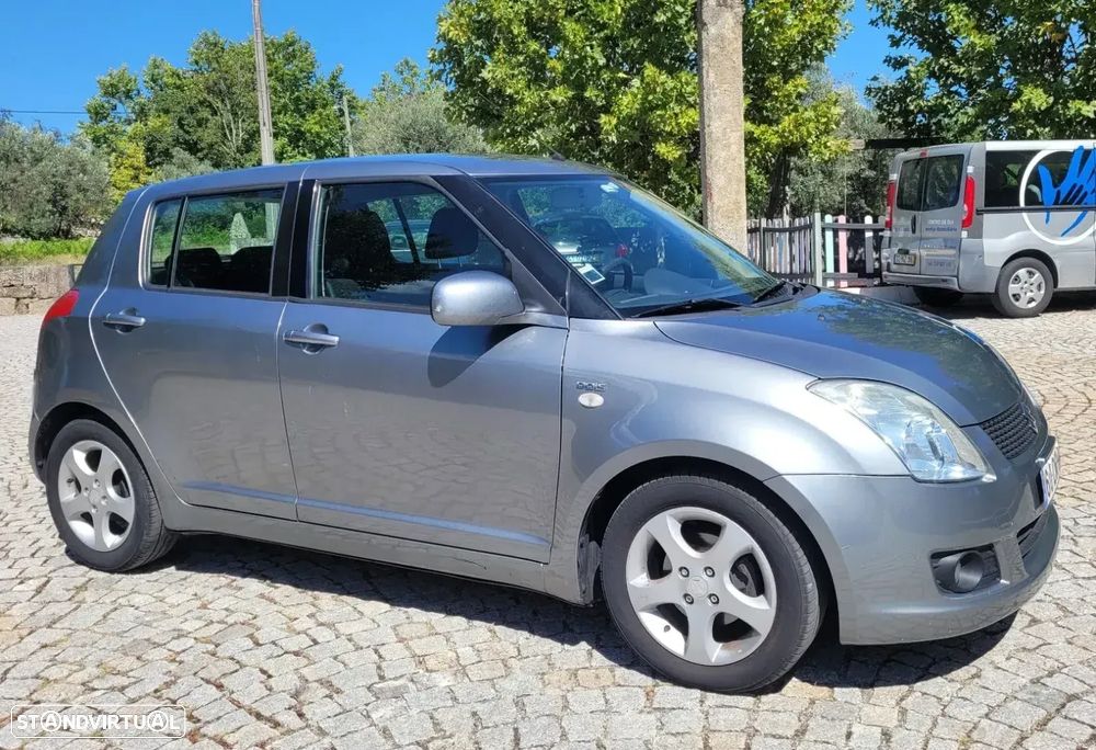 Suzuki Swift 1.3 DDiS GL - 1