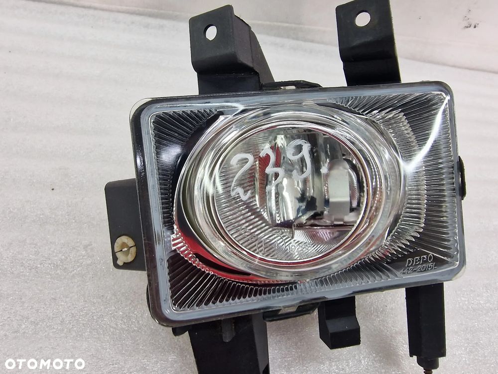 OPEL ASTRA H , ZAFIRA B 04- LEWY HALOGEN , NR AUKCJI H239 - 4