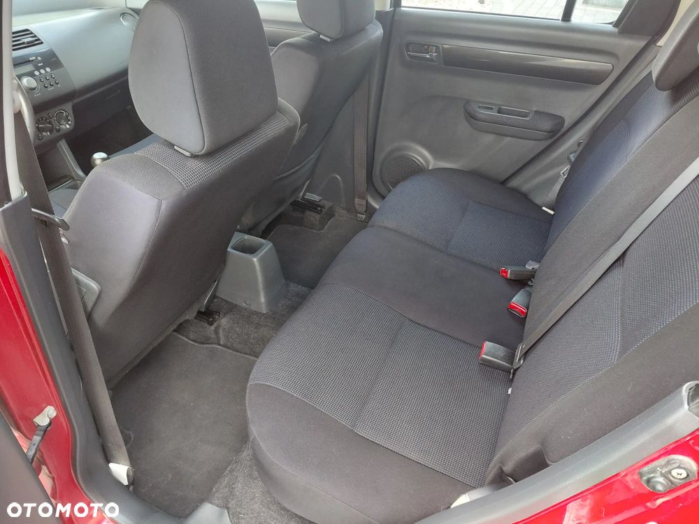 Suzuki Swift 1.3 Club - 9