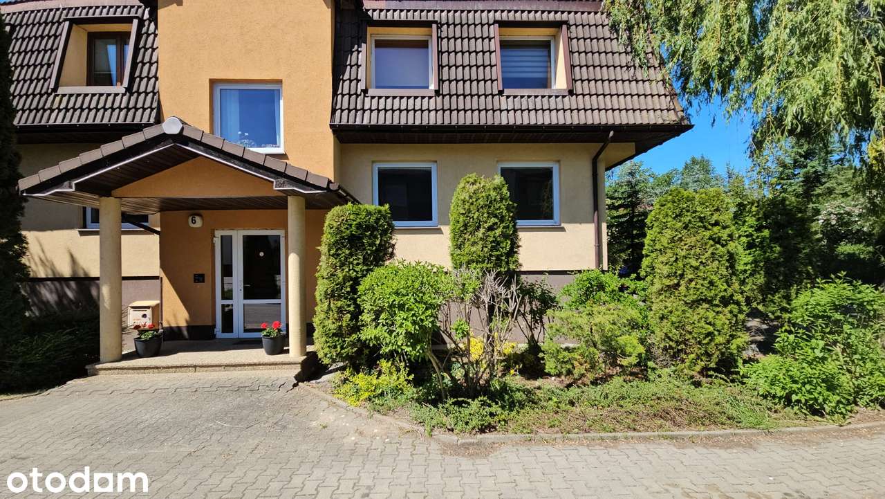 Mieszkanie dwupoziomowe z garażem i ogródkiem