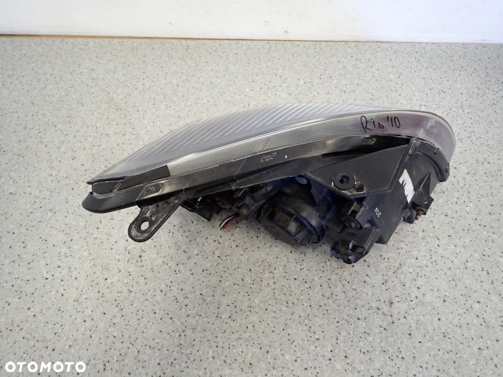 KIA RIO II 10-12 REFLEKTOR LEWY LAMPA PRZEDNIA LEWA - 12