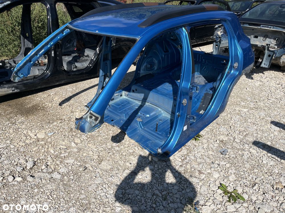 Pas tylny dupa z dachem ćwiartka błotnik Dacia Spring - 1