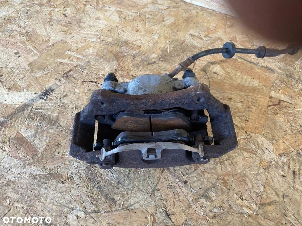 ZACISK HAMULCOWY PRZÓD LEWY AUDI A6 A7 4G 4G0105AK - 9