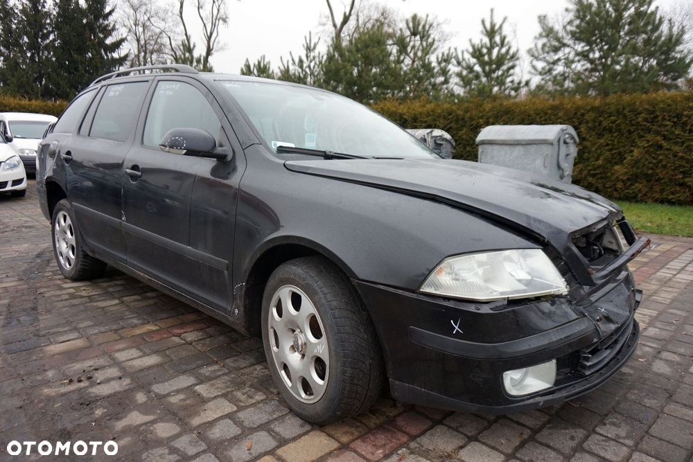 SKODA OCTAVIA II LIFT KOMBI 2008 9910 2.0 TDI BMM 140KM KNS CZARNY na części - 7