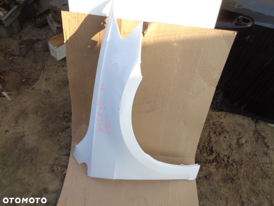 VW GOLF VII BŁOTNIK PRAWY PRZÓD