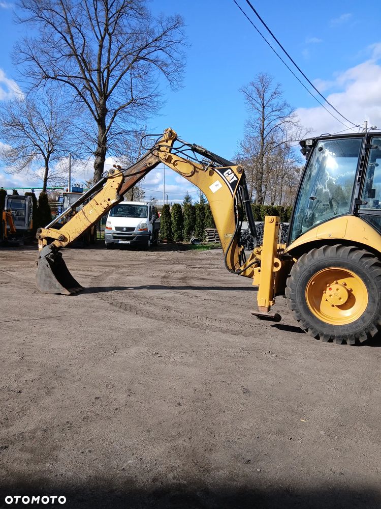 Caterpillar 428 E - 7