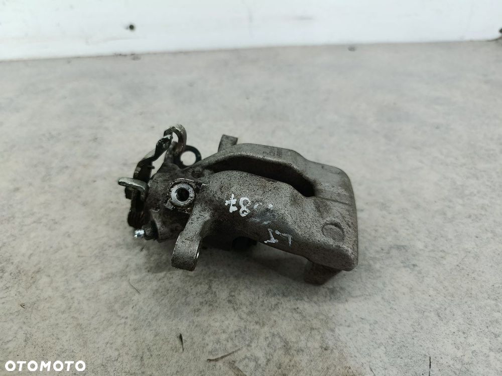 ZACISK HAMULCOWY LEWY TYŁ OPEL ASTRA H CZH1414 ABE 1.9 CDTI - 3