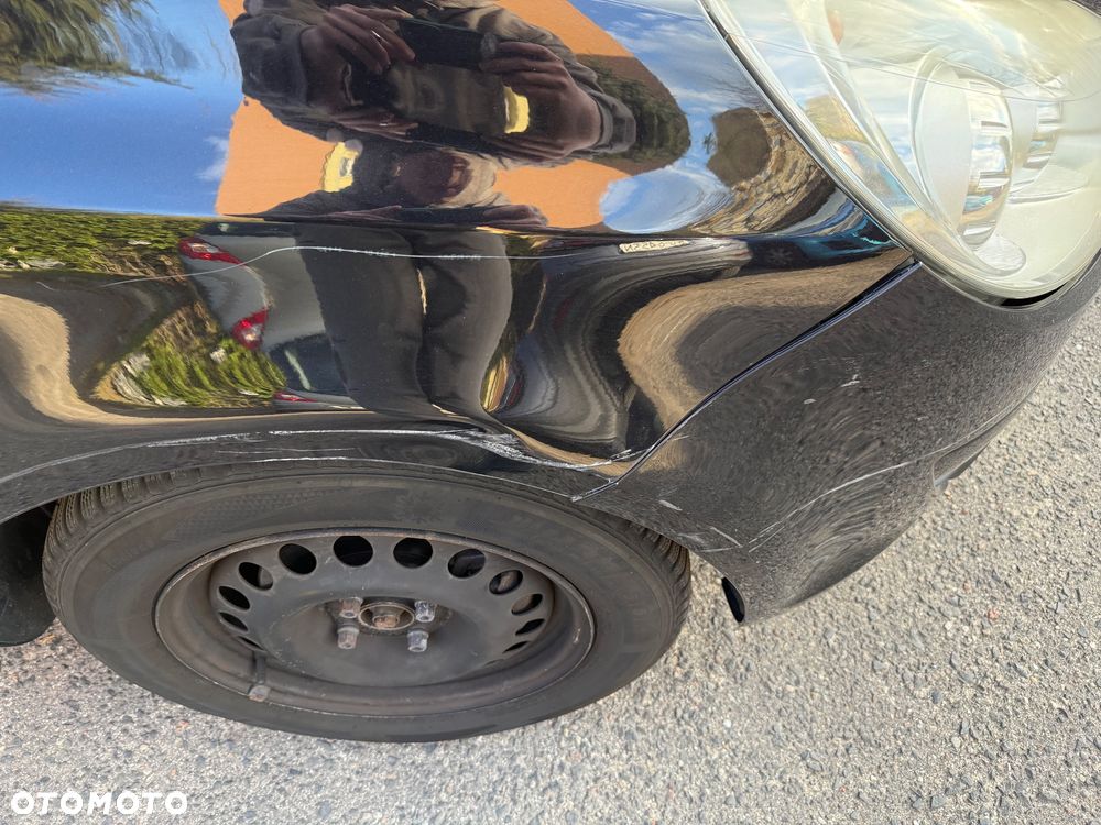 Opel Corsa 1.2 16V Enjoy - 7