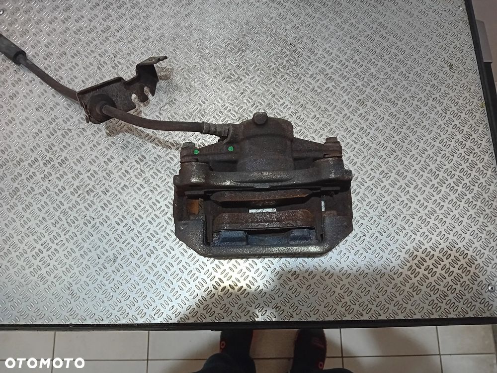 zacisk hamulcowy lewy tył Fiat Ducato III 2021 Y04075A - 2