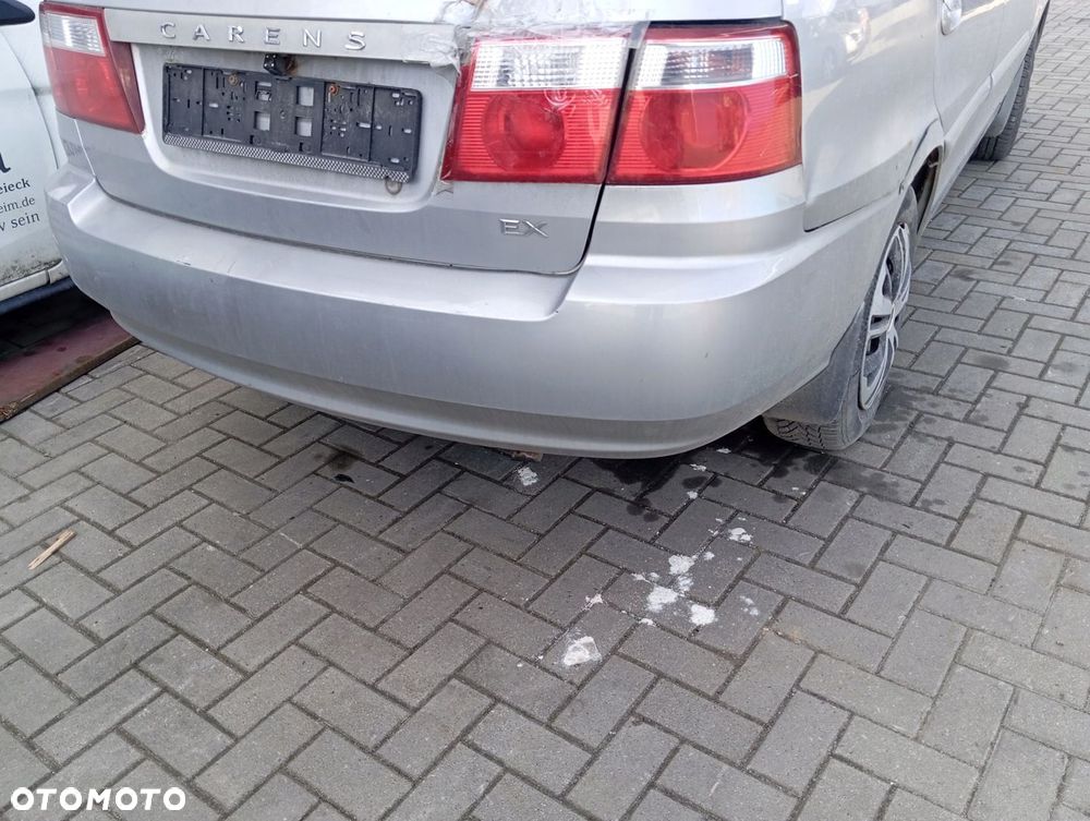 KIA CARENS II ZDERZAK TYLNY TYŁ C5 - 1