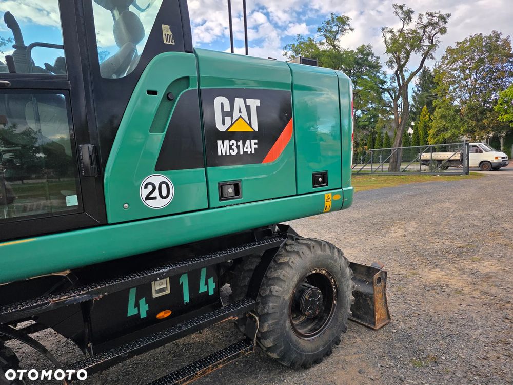Caterpillar M314F / M 314 / M315 / M316 / M317 jak VOLVO EW - 12