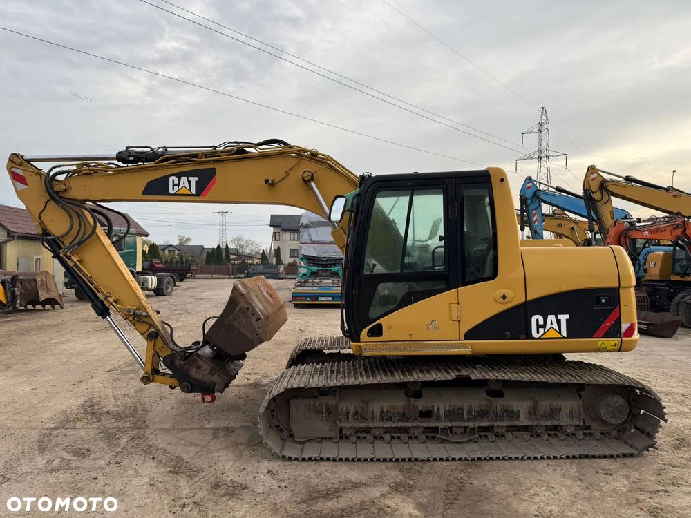 Caterpillar Cat 312 CL Błotniak z Niemiec