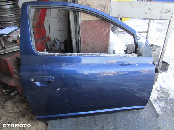 drzwi kompletne przód prawe lub lewe do TOYOTA YARIS I przedlift granat 1999