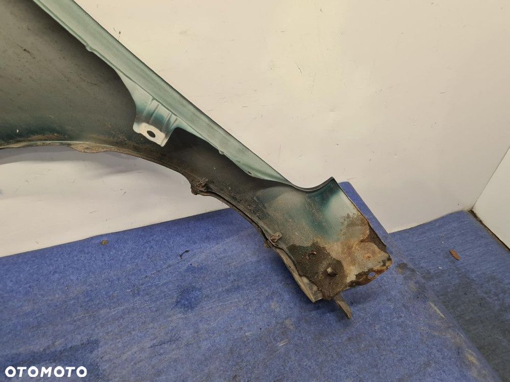 TOYOTA YARIS II LIFT BŁOTNIK PRZÓD PRAWY 6S3 - 9