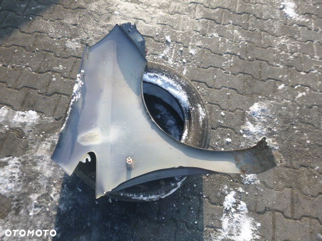 BŁOTNIK LEWY PRZÓD LEWY PRZEDNI OPEL CORSA D Z168 - 13