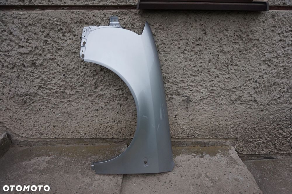 BŁOTNIK PRZEDNI LEWY AUDI A6 C5 LY7W 97/01r - 2