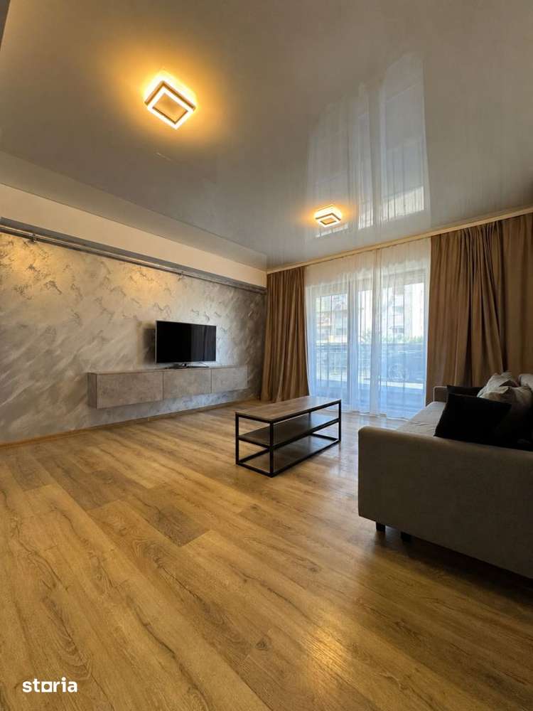 Apartament la parter cu balcon si loc de parcare acoperit