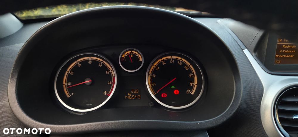 Opel Corsa 1.2 16V Enjoy - 23