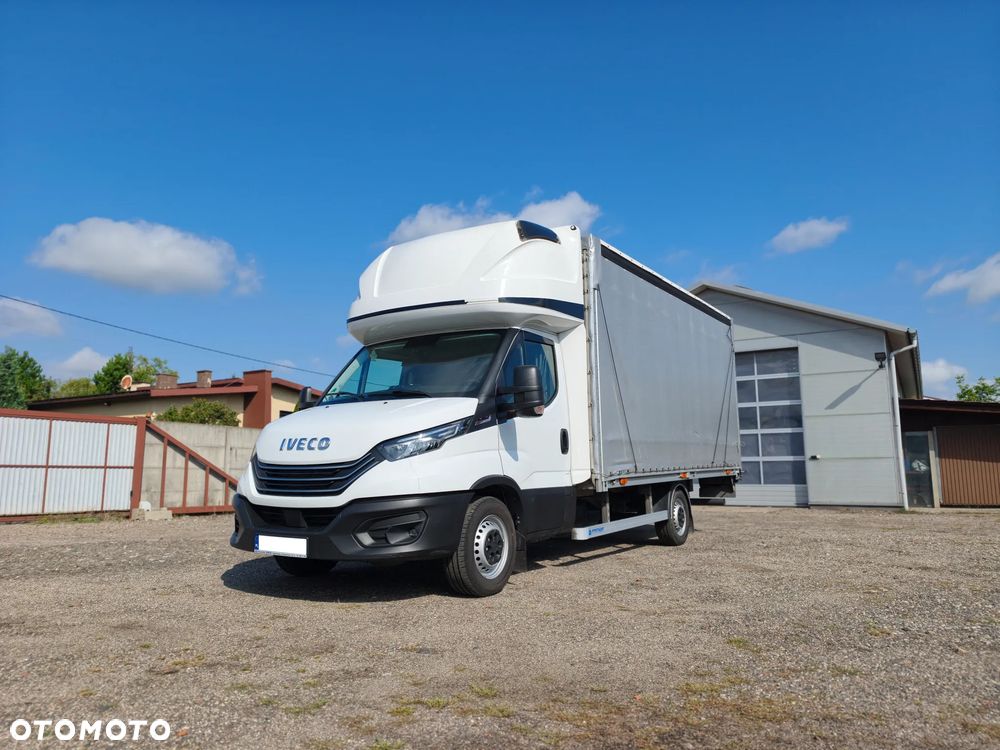 Iveco DAILY FIRANA 10EP WINDA DHOLLANDIA PLANDEKA 3.0 180KM HIMATIC AUTOMAT NAWIGACJA RADAR ASYSTENT PASA SERWIS ASO BEZWYPADKOWY ZADBANY 2024 FV23% KLIMA WEBASTO 35S18 - 3