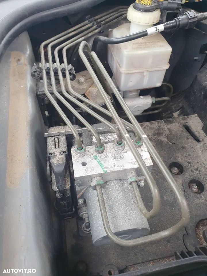 Unitate modul pompa ABS toba intermediara finala senzor suspensie pneumatica perna aer caseta directie motoras cutie transfer ventilator racire centura centuri siguranta Land Rover Discovery 3 motor 2.7 tdv6 an 2007 190cp dezmembrez dezmembrari piese - 1