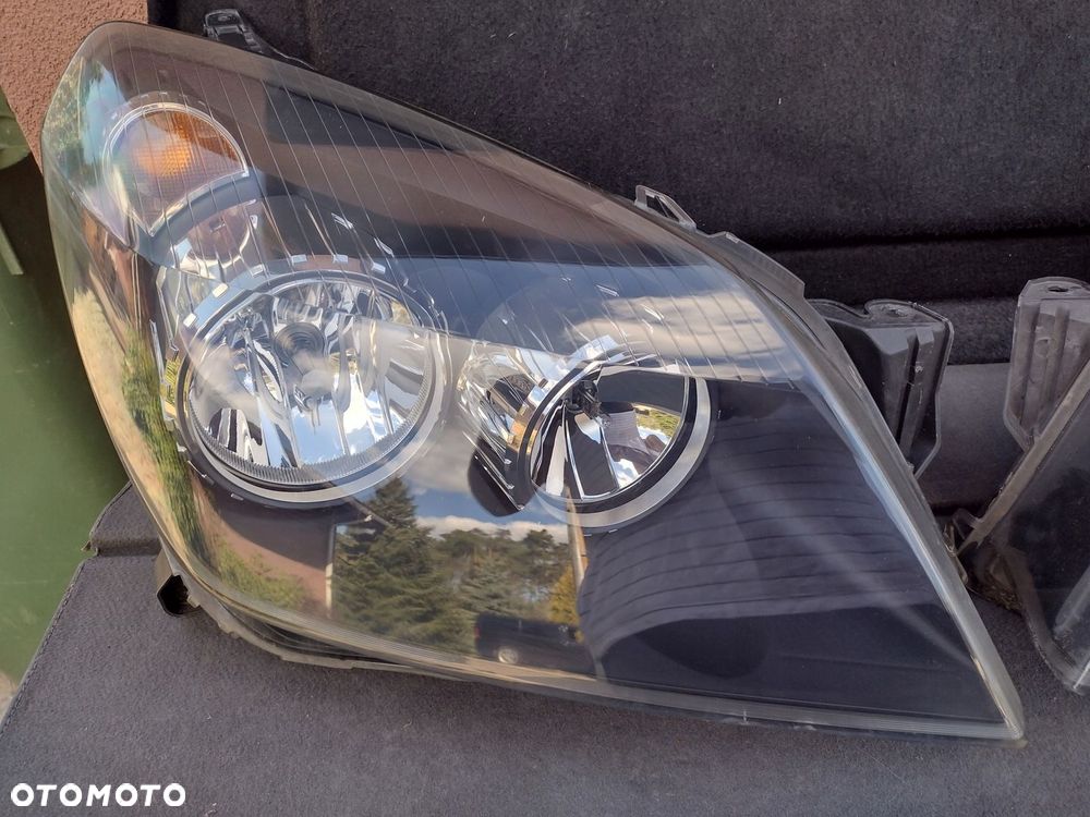 lampa opel astra h III GTC prawa eu cała - 1
