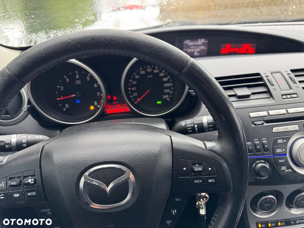 Mazda 3 2.0 MZR DISI High-Line - 12