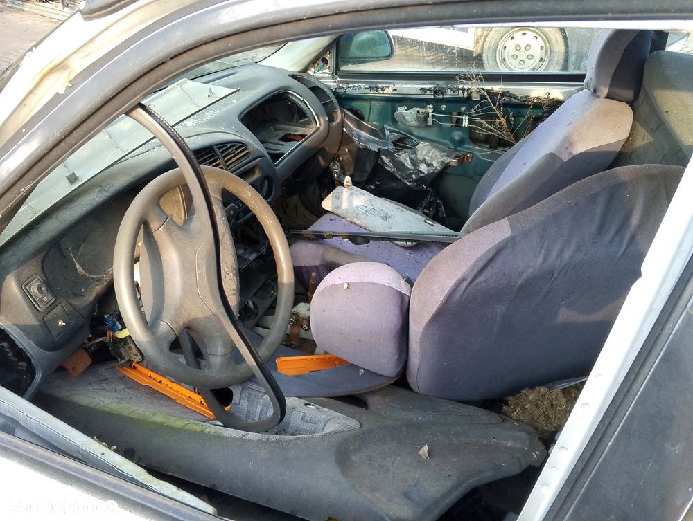 Mitsubishi Mirage CK2A Po Lift (99-03r.) 1.5 B 110KM. Silnik 4G15 Skrzynia F5M41 lakier A69 / A69A. Cały na części. GWARANCJA !!! Przód Tył Zestaw Komplet Drzwi Klapa Zderzak Błotnik Maska Grill Atrapa Szyba Pas Lampa Lusterko Boczki Fotel Kanapa Kokpit Deska Rozdzielcza Przełącznik Włącznik Sterownik Przewody Wiązka Instalacja Moduł Komputer Czujnik Listwa Pompa Alternator Wtryski Głowica Rozrusznik Kompresor Sprzęgło Dwumas Silnik Skrzynia ABS Klimatyzacji Paliwa Wspomagania Kolektor Turbina Przepustnica Zawór Chłodnica Koło Hak Belka Sanki Zawieszenie Mcpherson Półoś Amortyzator Wydech Tłumik Zacisk Most - 8