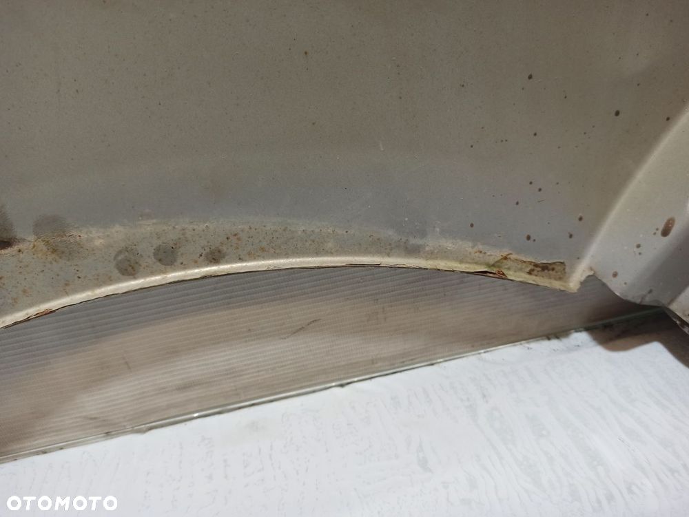 BŁOTNIK LEWY PRZEDNI OPEL VIVARO A - 11