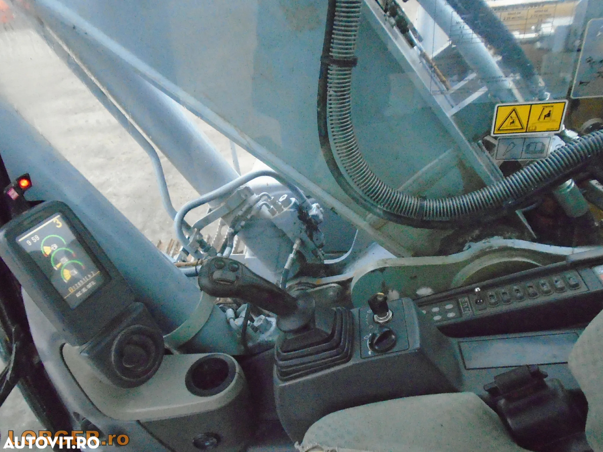 Cat 319D - 12