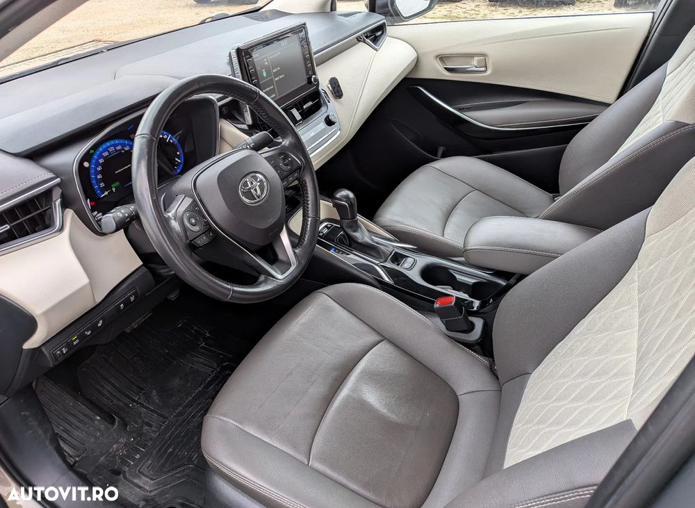 Toyota Corolla 1.8 HSD Exclusive Plus tapiterie Gri - 9