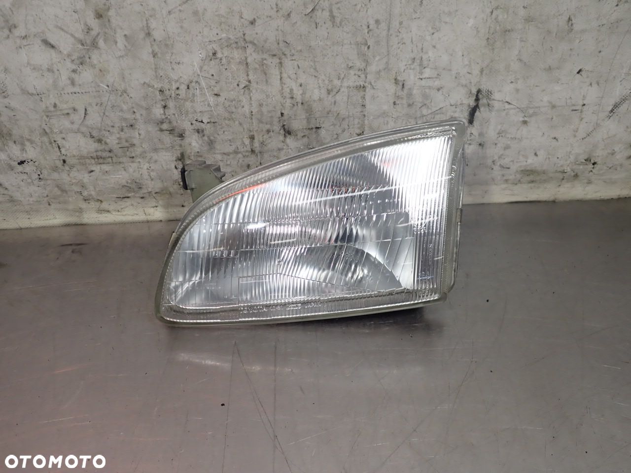 LAMPA LEWA PRZEDNIA TOYOTA STARLET V - 1