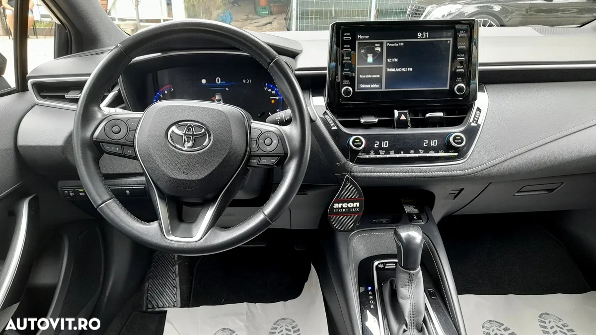 Toyota Corolla 1.8 HSD Exclusive - 37