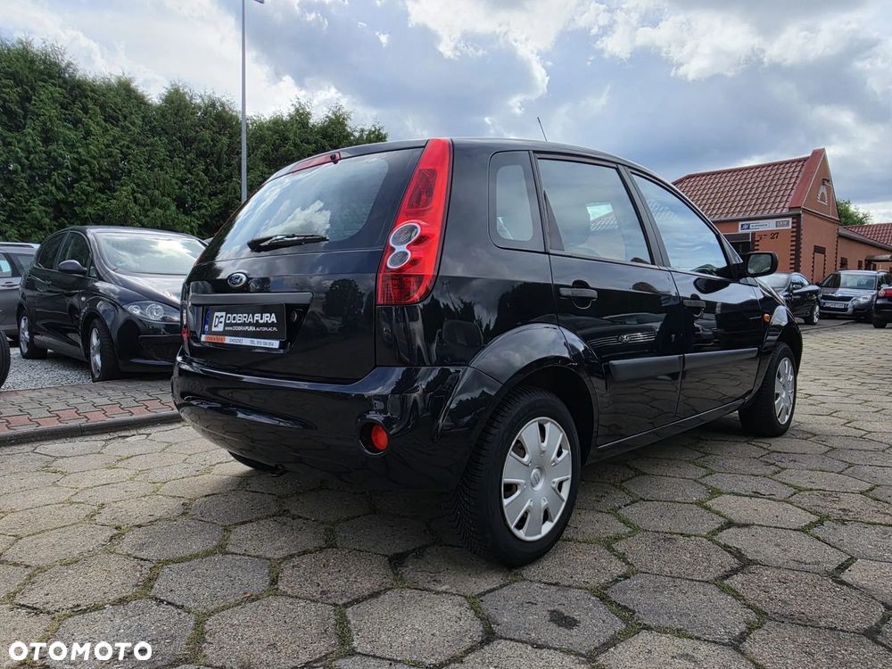Ford Fiesta 1.4 Ghia - 34