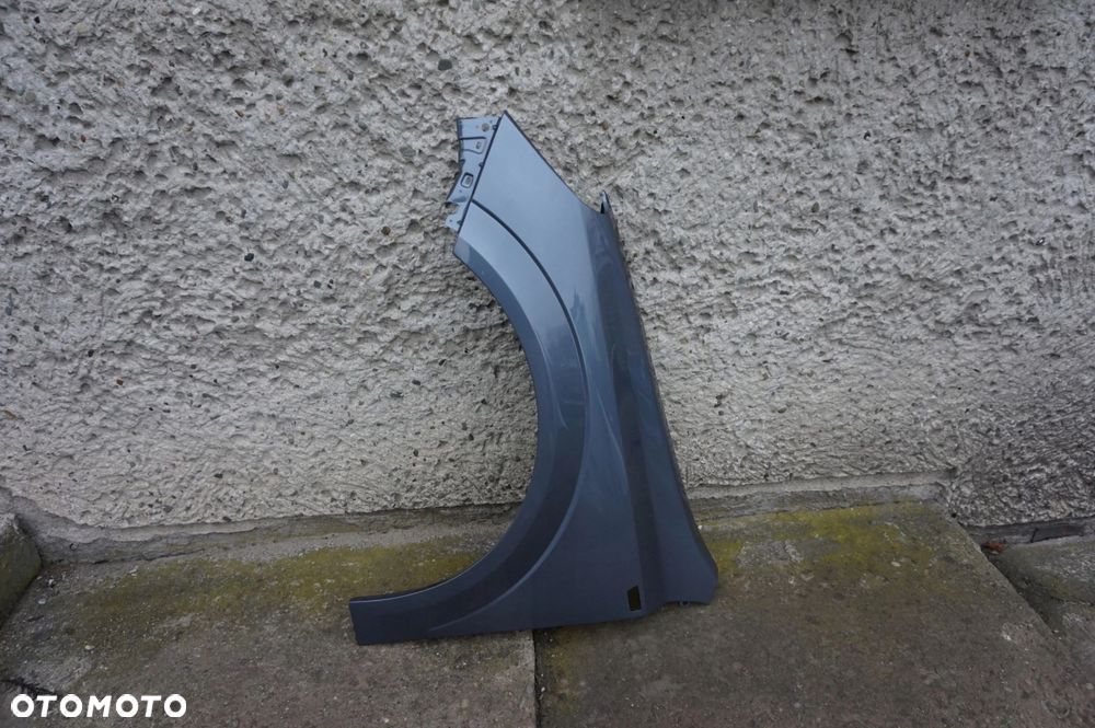 BŁOTNIK PRZEDNI LEWY OPEL ASTRA III H Z155 - 2