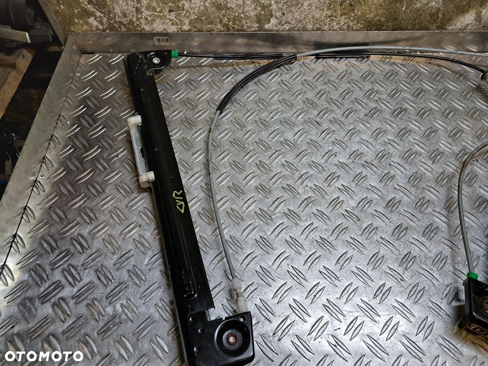 Podnosnik  szyby Lewy Mini Cooper R50 R53 - 2