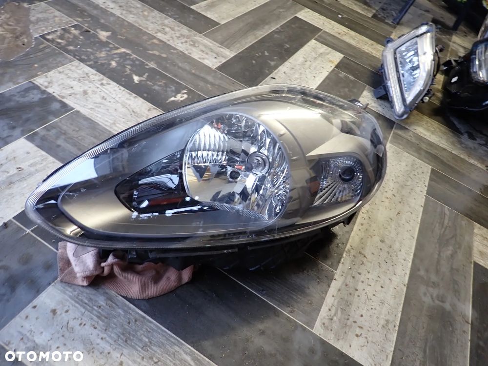 FIAT PUNTO EVO LAMPA LEWY PRZÓD 89102044SX - 1