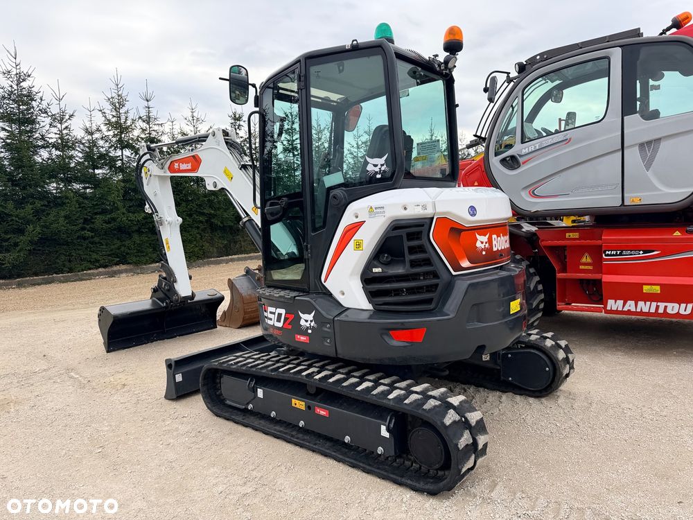 Bobcat Minikoparka Bobcat e50Z 5ton e55 e60 Cat 303.5 304  305 3xłyżki Ramię LOONG dodatkowe linie hydr wyjścia AUX1 + 2 przeciw waga MAX-dociążenie gąsienice 85% od nowości 1 właściciel z Niemiec Auto IDLEE po serwisie Widły wiertnica grabie i inne za dopłatą Szybkozłącze hydr Miller łyżka przedsiębierna Pług  Kubota Takeuchi Jcb - 1