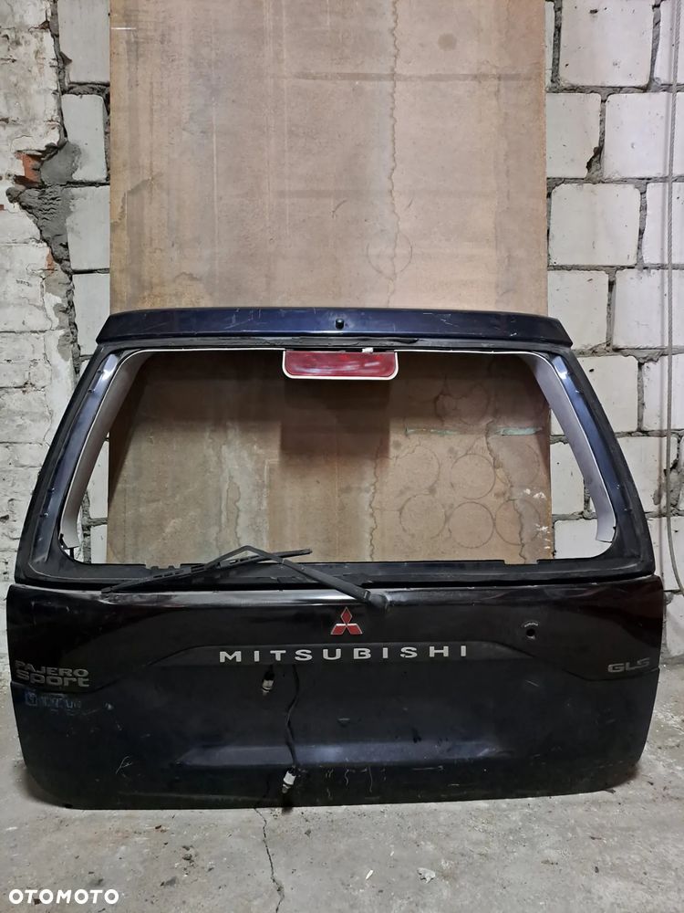 Maska / klapa bagażnika Mitsubishi Pajero Sport GLS oryginalna (granatowa) - 1