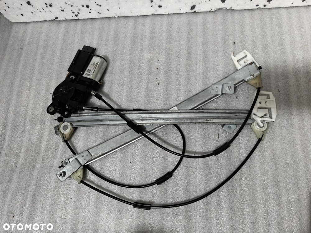 Renault Megane II 5d Podnośnik szyby lewy przód mechanizm