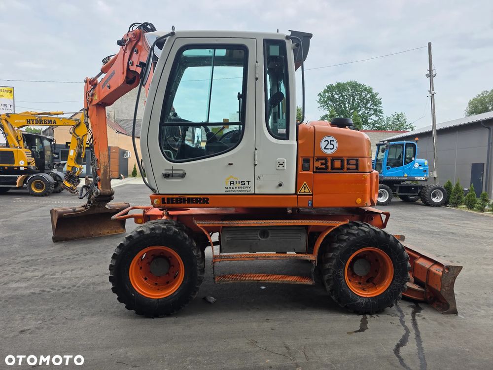 Liebherr A309 Litronic - 8