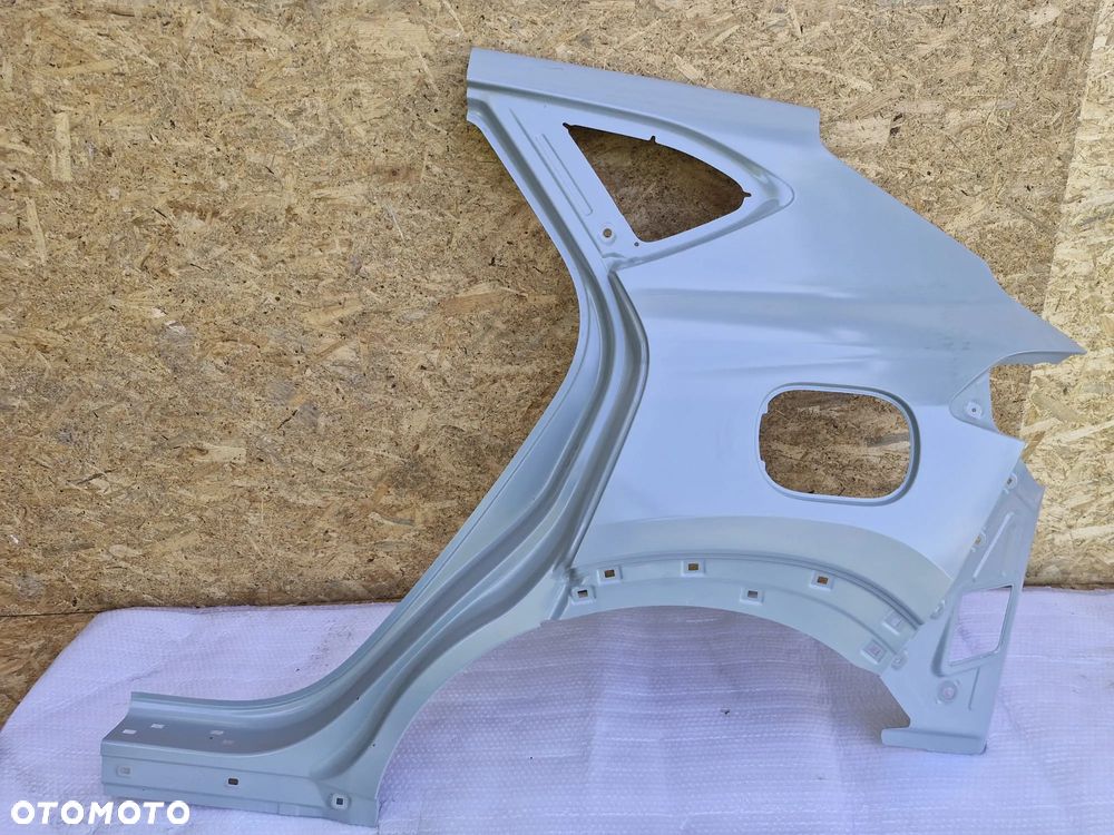HYUNDAI TUCSON III LIFT BŁOTNIK LEWY TYŁ NOWY - 1