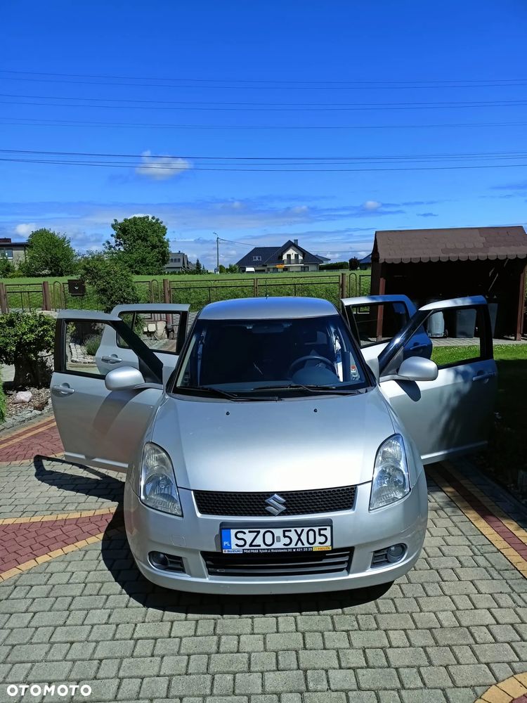 Suzuki Swift 1.3 Club - 7