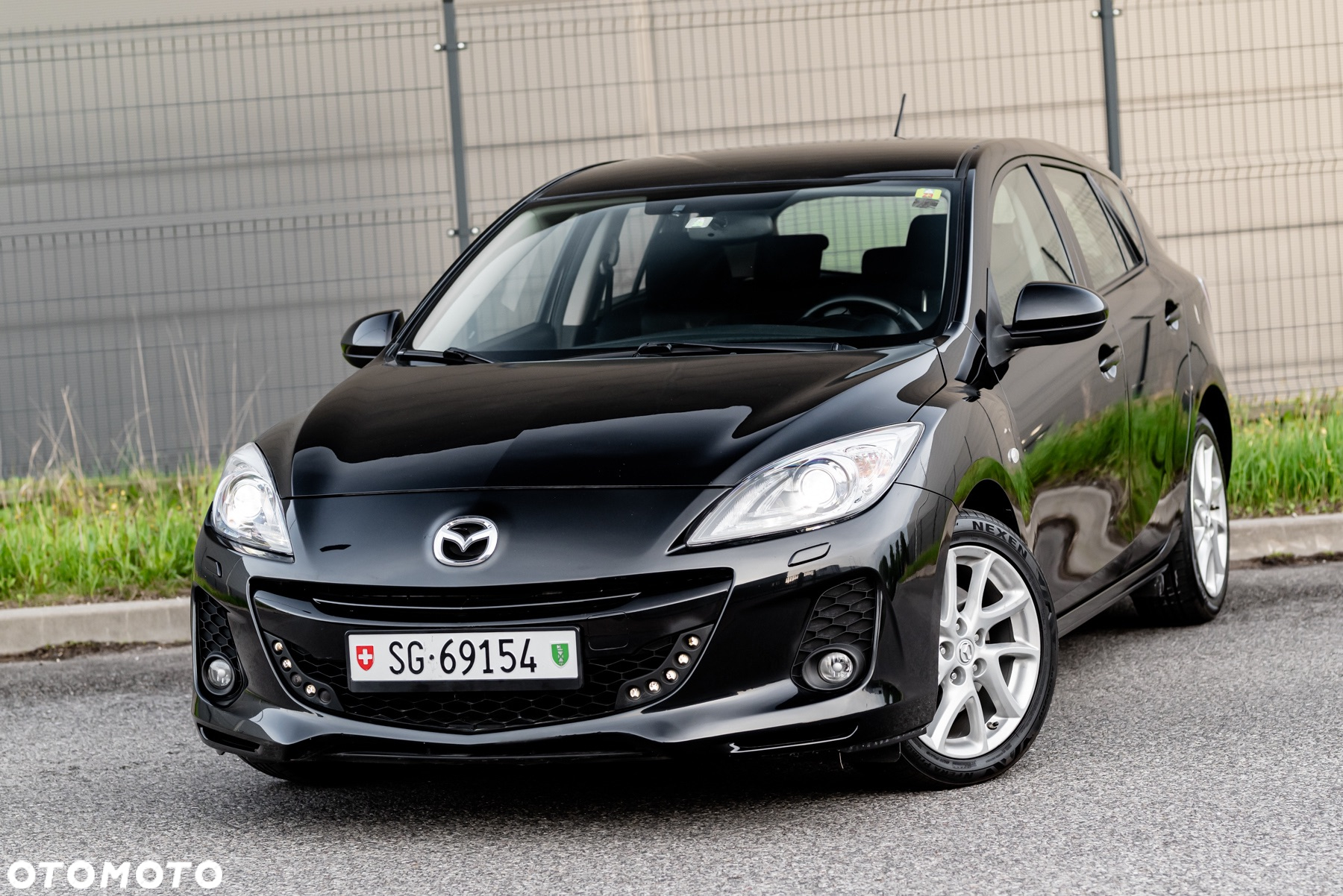 Mazda 3 2.0 MZR DISI Sports-Line - 2