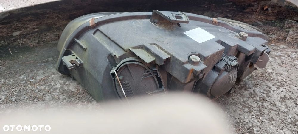 .  PRZOD PRZEDNIA LAMPA LEWA AUDI A4 B7 - 4