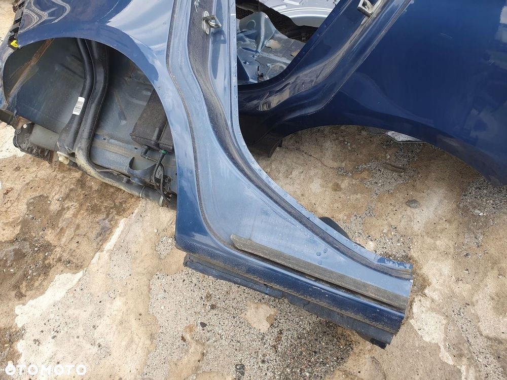 błotnik prawy tył Opel Corsa E 5d - 4