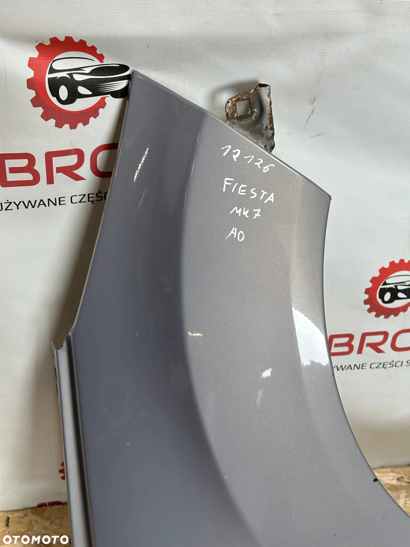 BŁOTNIK PRZEDNI PRAWY FORD FIESTA MK7  A0 - 2
